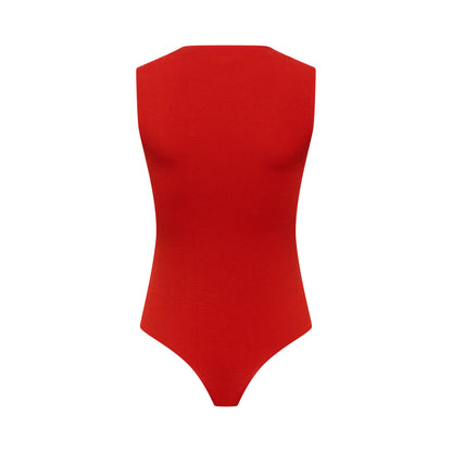 EMMI bodysuit hollowman, back view, burnt red