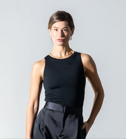 CLEO seamless tank bodysuit made in Italy from superfine merino, minimalist layering base layer, styled for cocktail party, black