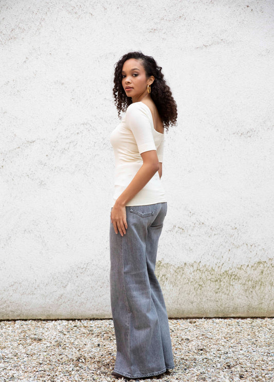 MIA square-neck top styled with jeans, back view squareneck, bright cream