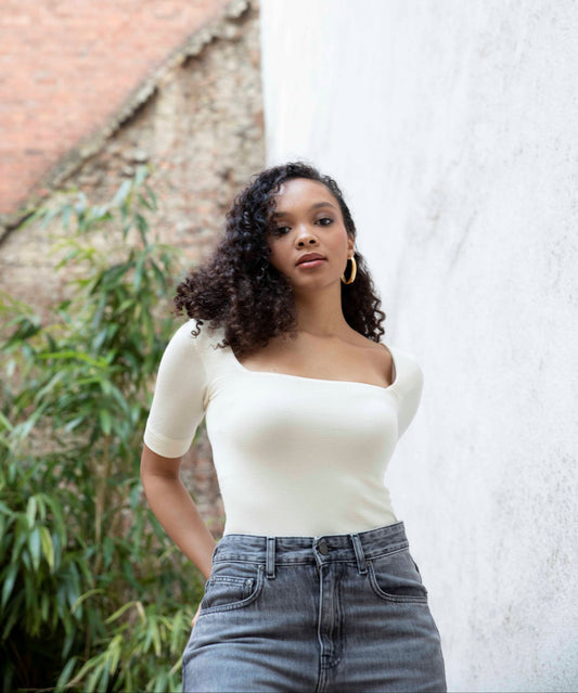 MIA square-neck top crafted in Italy from superfine merino, architectural half-sleeve essential, bright cream