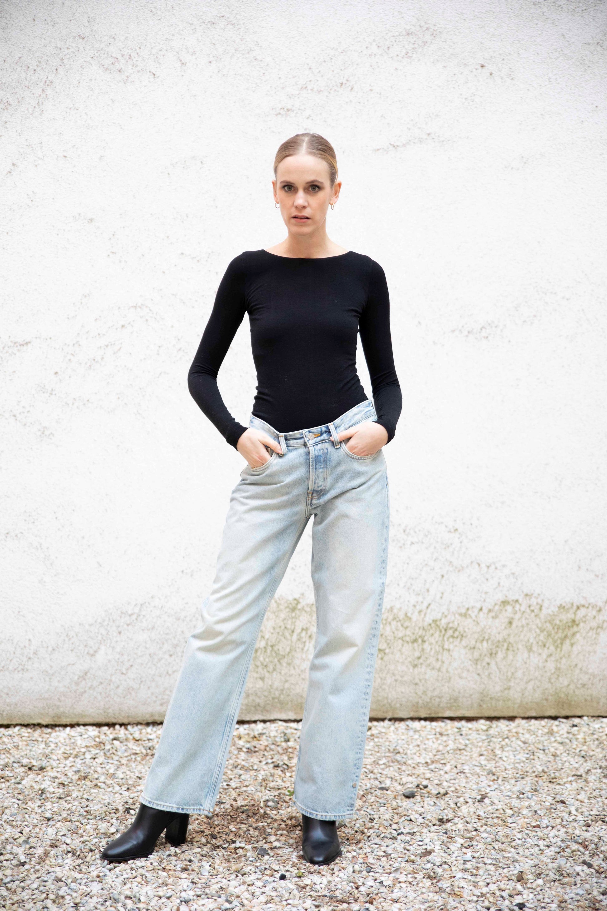 VALENTINA boatneck top styled with jeans and boots, front view, black
